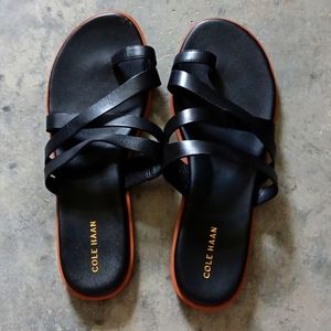 Sandals black leather upper no size 71/2?? Shoe measures 10"  heel to toe.